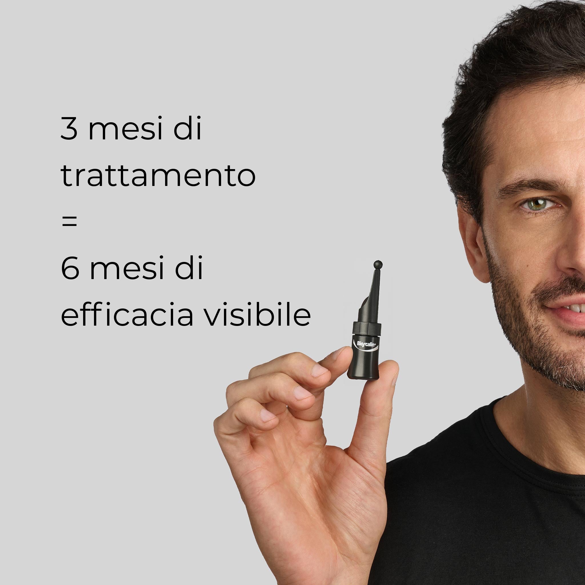 Primo piano di un uomo che tiene in mano una fiala anticaduta della linea Bioscalin® Pro•Density uomo